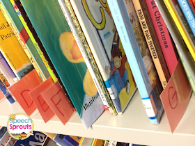 Organize your storybooks alphabetically in your speech therapy room and use dividers to easily find the titles. Read more speech room organization tips at www.speechsproutstherapy.com #speechsprouts #speechtherapy #organization #speechroom