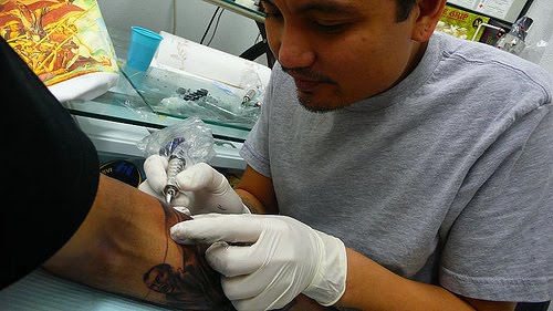  is a selftaught Filipino tattoo artist who has been tattoing since 1994 