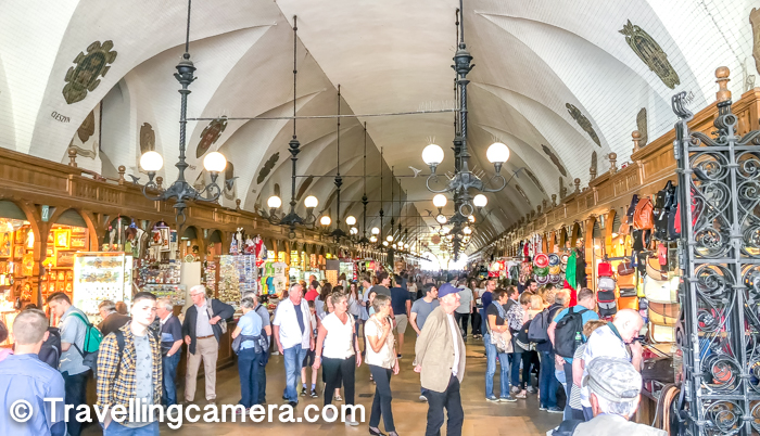 The oldest trade centre in Poland is this Cloth Hall which has Renaissance architecture. This is one of the biggest buildings in Market Square of Krakow and has various sections which are dedicated to markets, restaurants and museums. In the photograph above you can see the market located in central part of the Cloth Hall.    Do check out following link for detailed blog-post on Cloth Hall and what else you should observe, experience and explore in this magnificent building of Main square in Krakow Old Town - The Renaissance Sukiennice Cloth Hall - One of the main places to explore in Krakow City of Poland    St. Mary's Basilica 