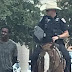 Black man led by rope by white cops on horseback sues Texas city