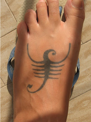 Tribal Tattoo This collection of crazy foot tattoos is pretty cool.