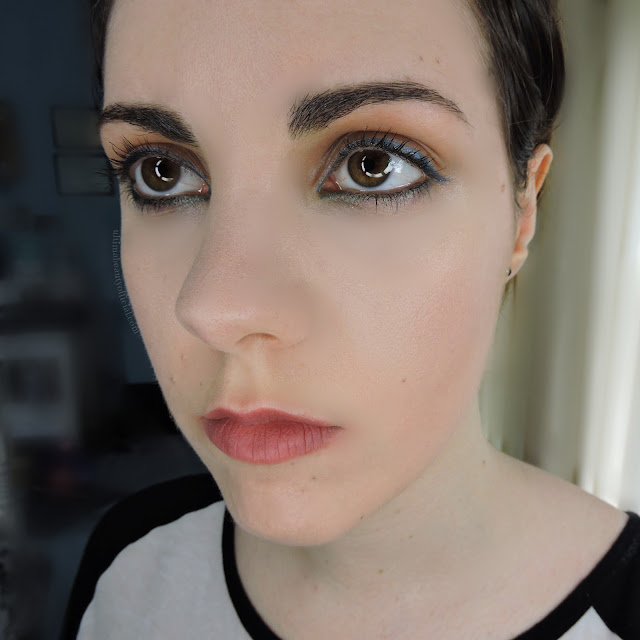 Ultima Beauty wearing color blocked eyeliner (eyes opened)