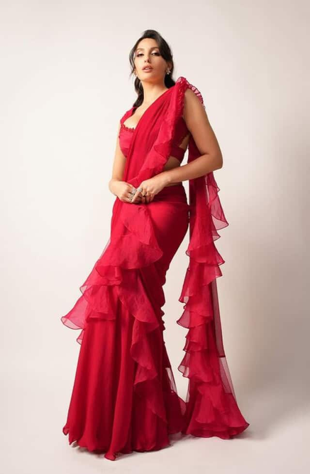 nora fatehi wreaked havoc in red ruffle saree