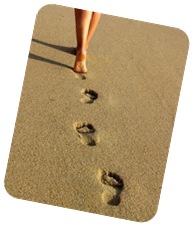 PEGADAS NA AREIA