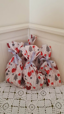 A bunch of (reusable) Christmas gift bags 