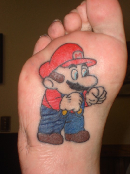 File:Tattoo superman jonesy. Mario cartoon character tattoo on foot.