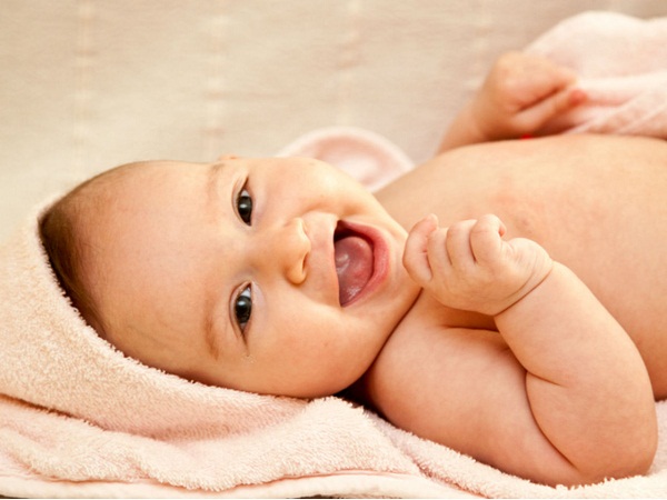Cute Newborn Baby Photo With A Smile