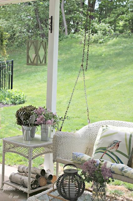 Covered patio ideas with wicker porch swing - www.goldenboysandme.com