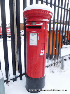 Postbox outside the sorting office Loughborough wearing a snowy hat