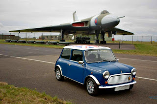 Mini with fighter jet in the background