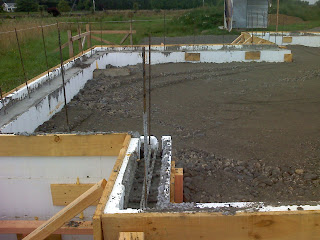 Foundation poured and centre being filled with river run