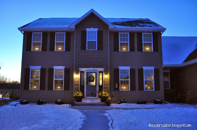 Winter Front Porch with lights - the colored door