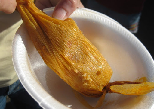 A tamal waiting to be unwrapped