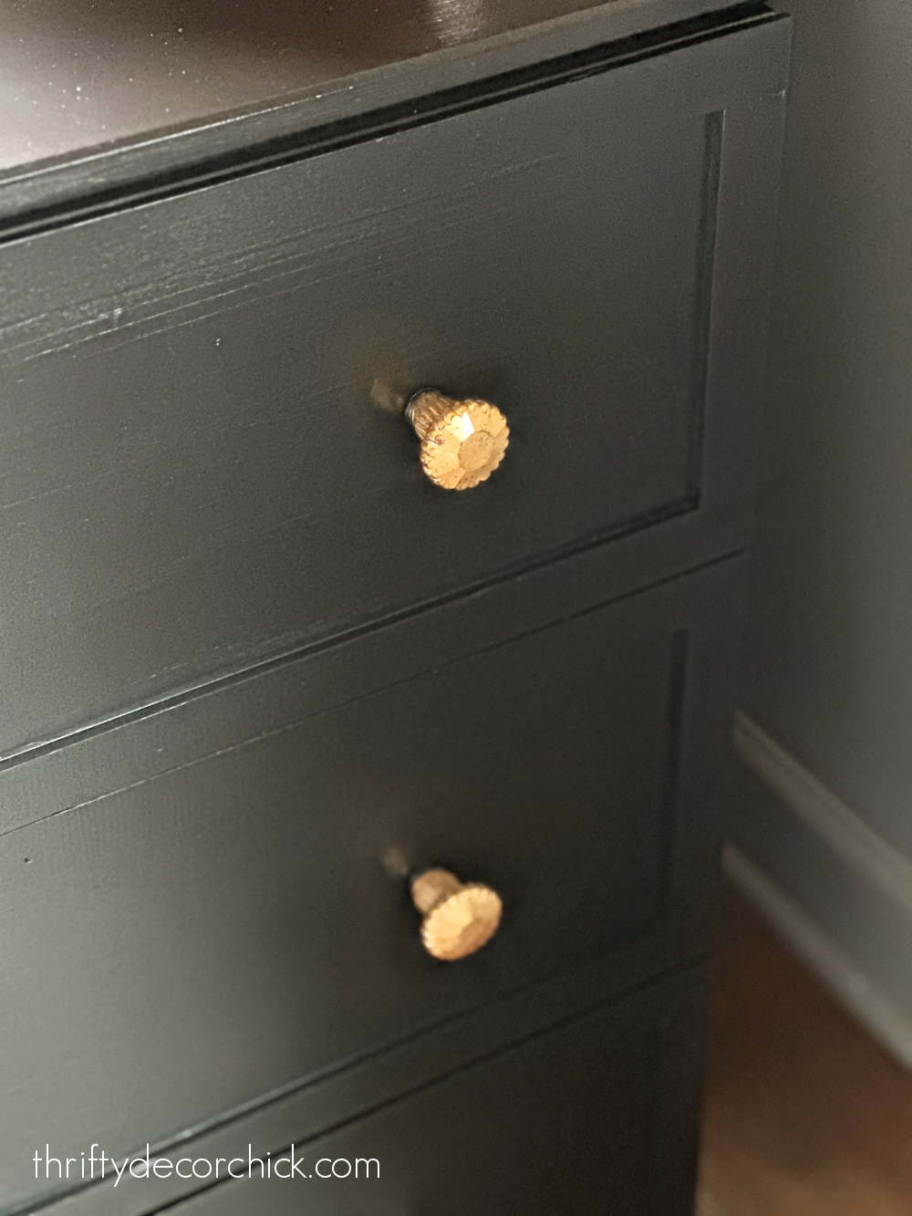 black dresser brass knobs
