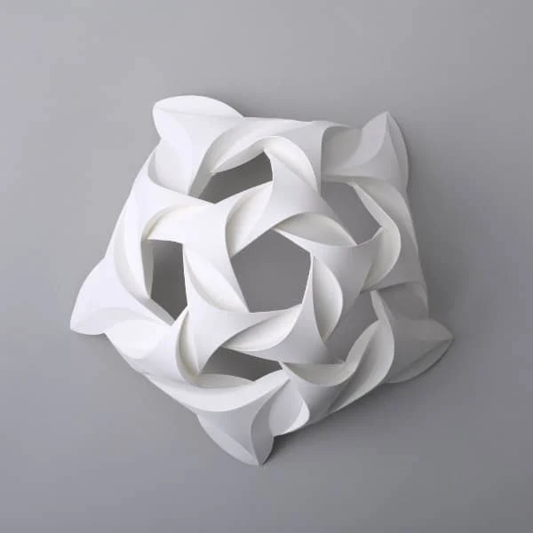 circular white creased and curved paper sculpture