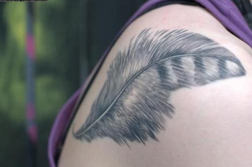 eagle feather tattoo. Feather Tattoos Designs and