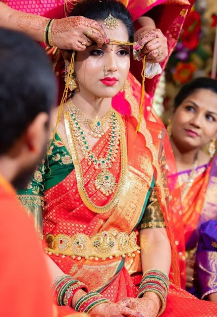 Bride in Kasu Mala Mesh Necklace