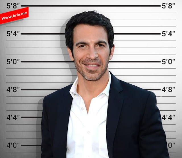 Chris Messina standing in front of a height chart