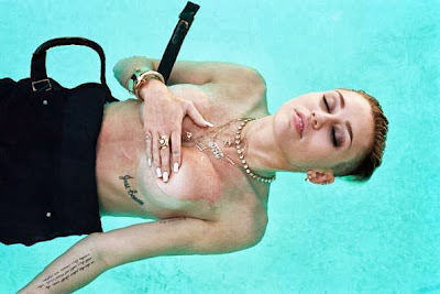 Miley Cyrus goes topless for Rolling Stone Magazine October 2013 photoshoot
