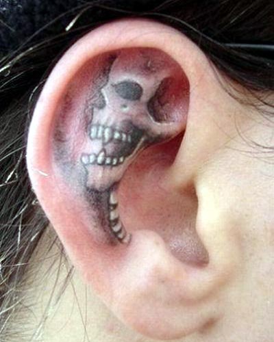 candy skull tattoo. day of the dead skull tattoo