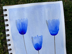 Three blue watercolour tulips