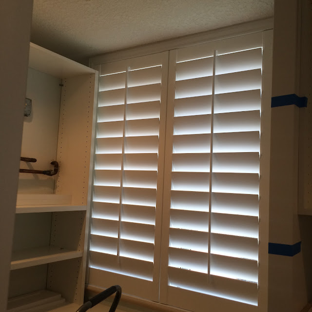 window treatments with half plantation shutters