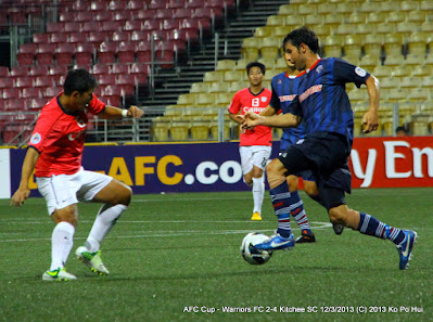 Warriors'   Mislav Karoglan (right) found it tough going in this AFC Cup match against Kitchee SC at the Jalan Besar Stadium back in March 2013