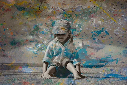 Child covered with paint