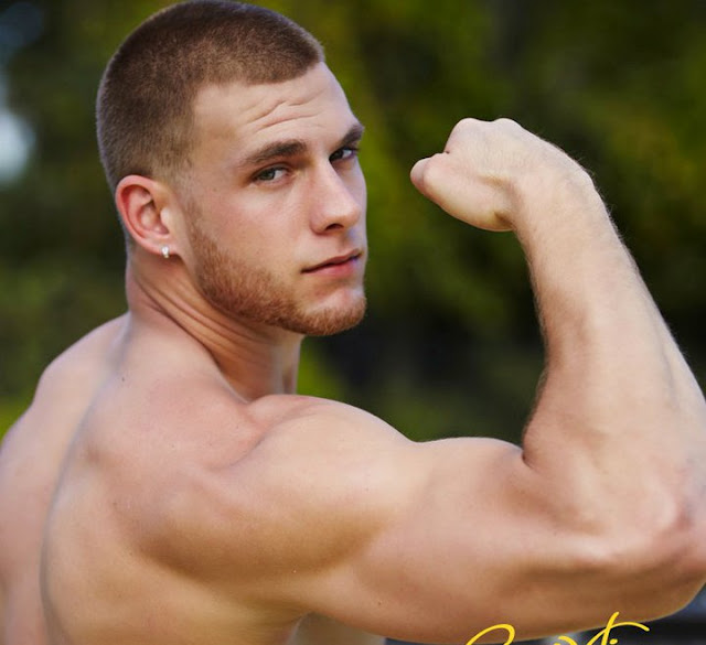 biceps flexing, guy in Hanes, muscle hunk