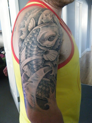 Half sleeve koi tattoo