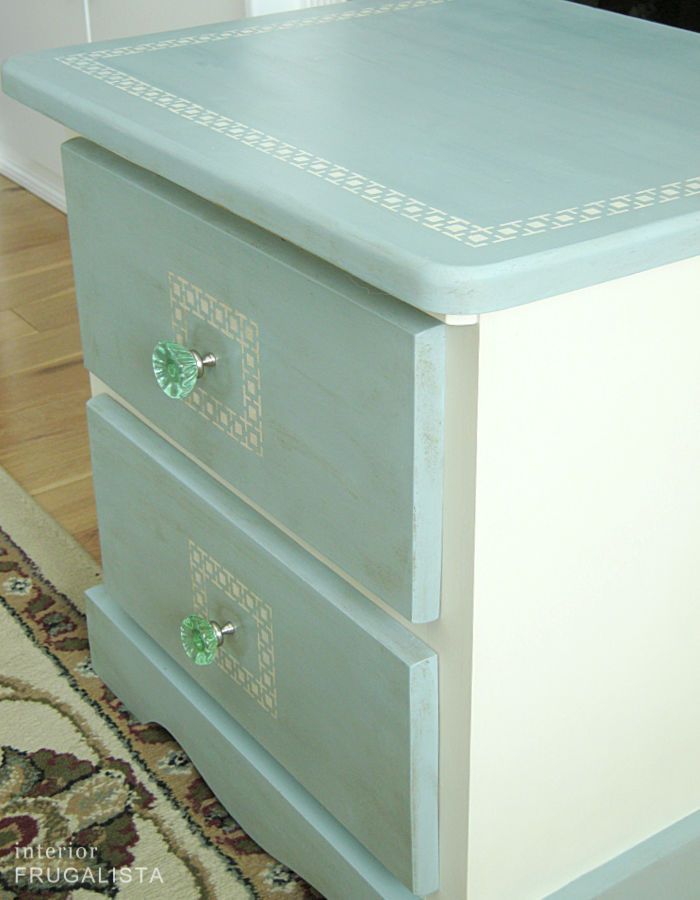A pine bedside table makeover with Greek key stencilled border.