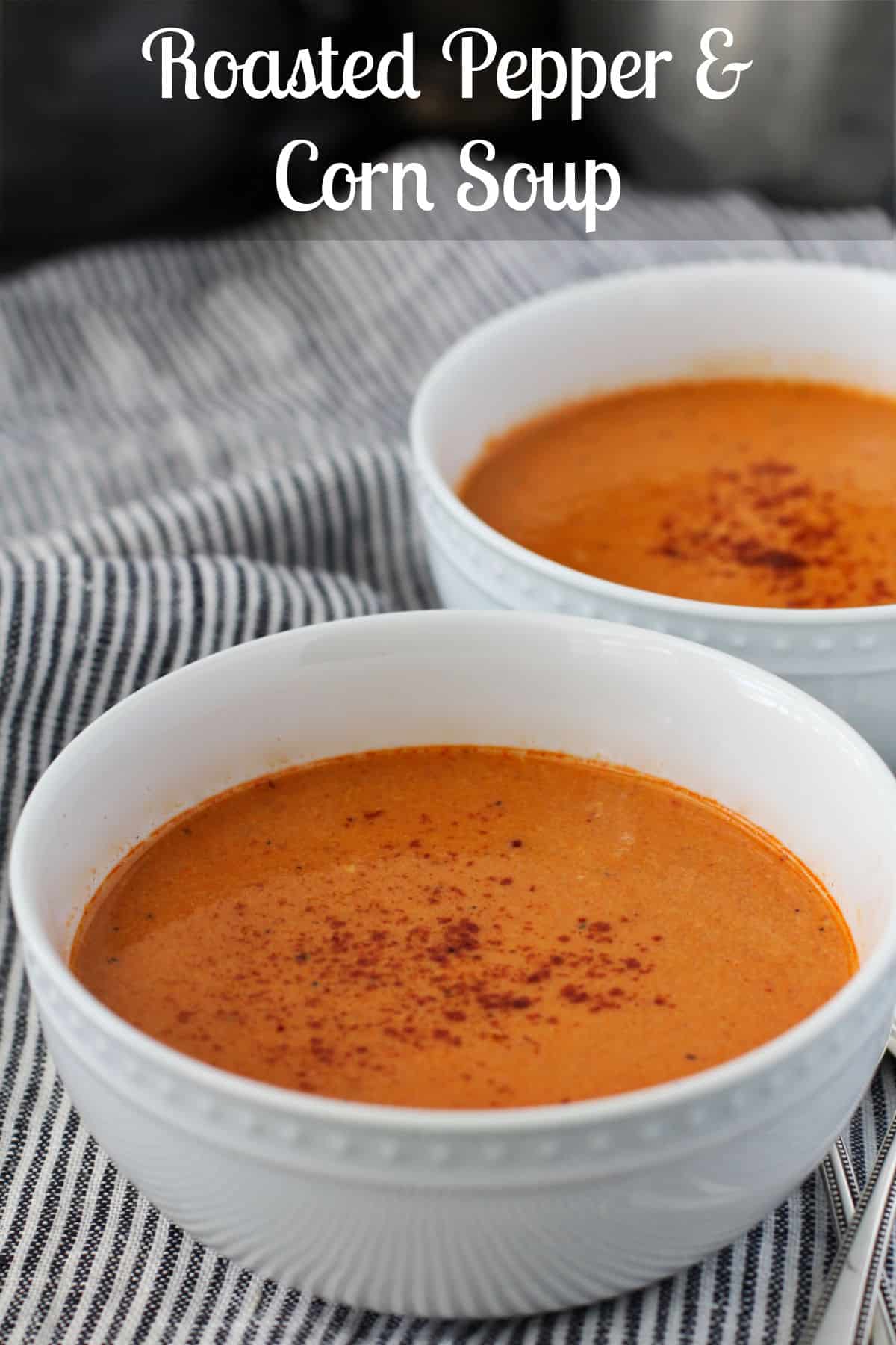 Corn and red pepper soup in bowls.