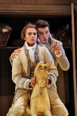 Isabel Leonard (Cherubino, on horse) and Luca Pisaroni (Figaro) in Le Nozze di Figaro, sets and costumes by Paul Brown, Santa Fe Opera, 2008 (photo © Ken Howard)