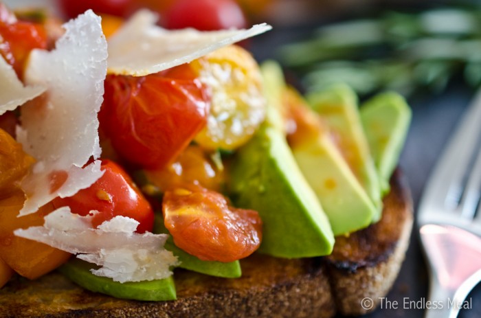 Tomato Avocado Toast with Shaved Parmesan