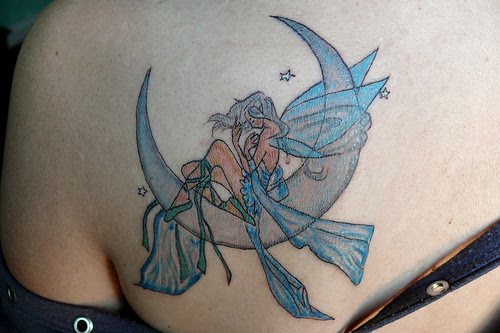 The fifth of my Moon Star Tattoos is this beautiful little Angel sitting on