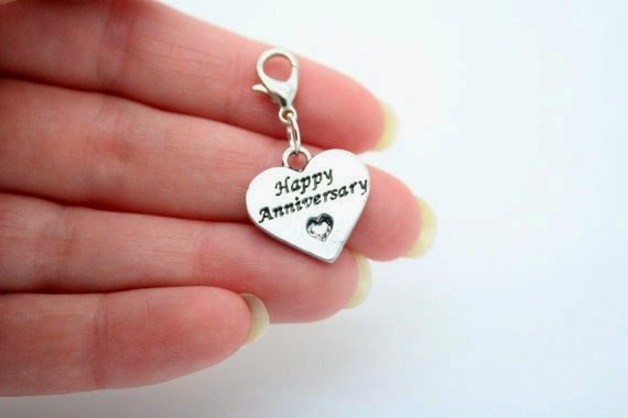 https://www.etsy.com/listing/183480612/stamped-happy-anniversary-charm?ref=favs_view_4