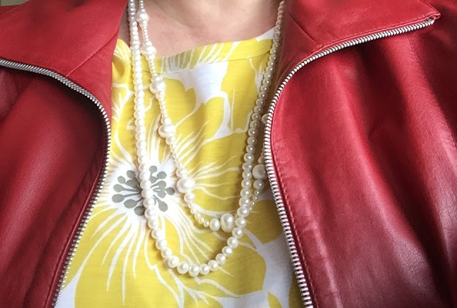 Kaffesoesters yellow and white t-shirt and red leather jacket