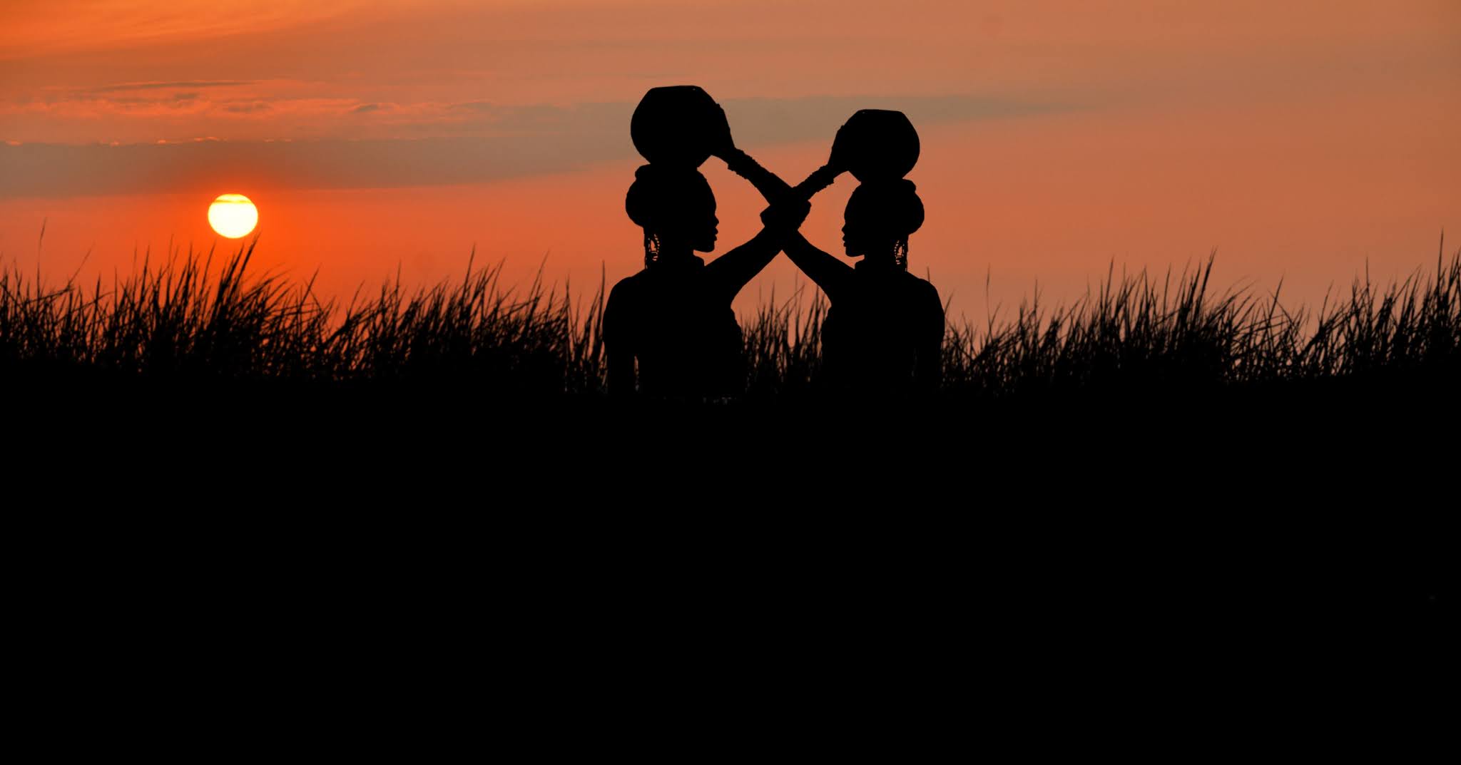 African women holding vase free image