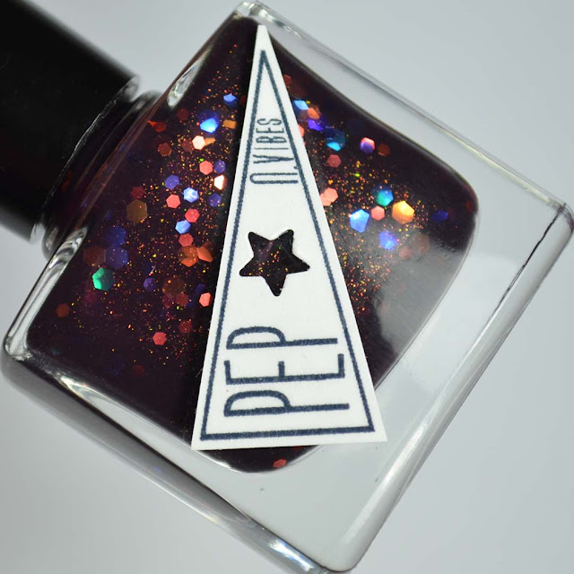 oxblood nail polish with iridescent glitter