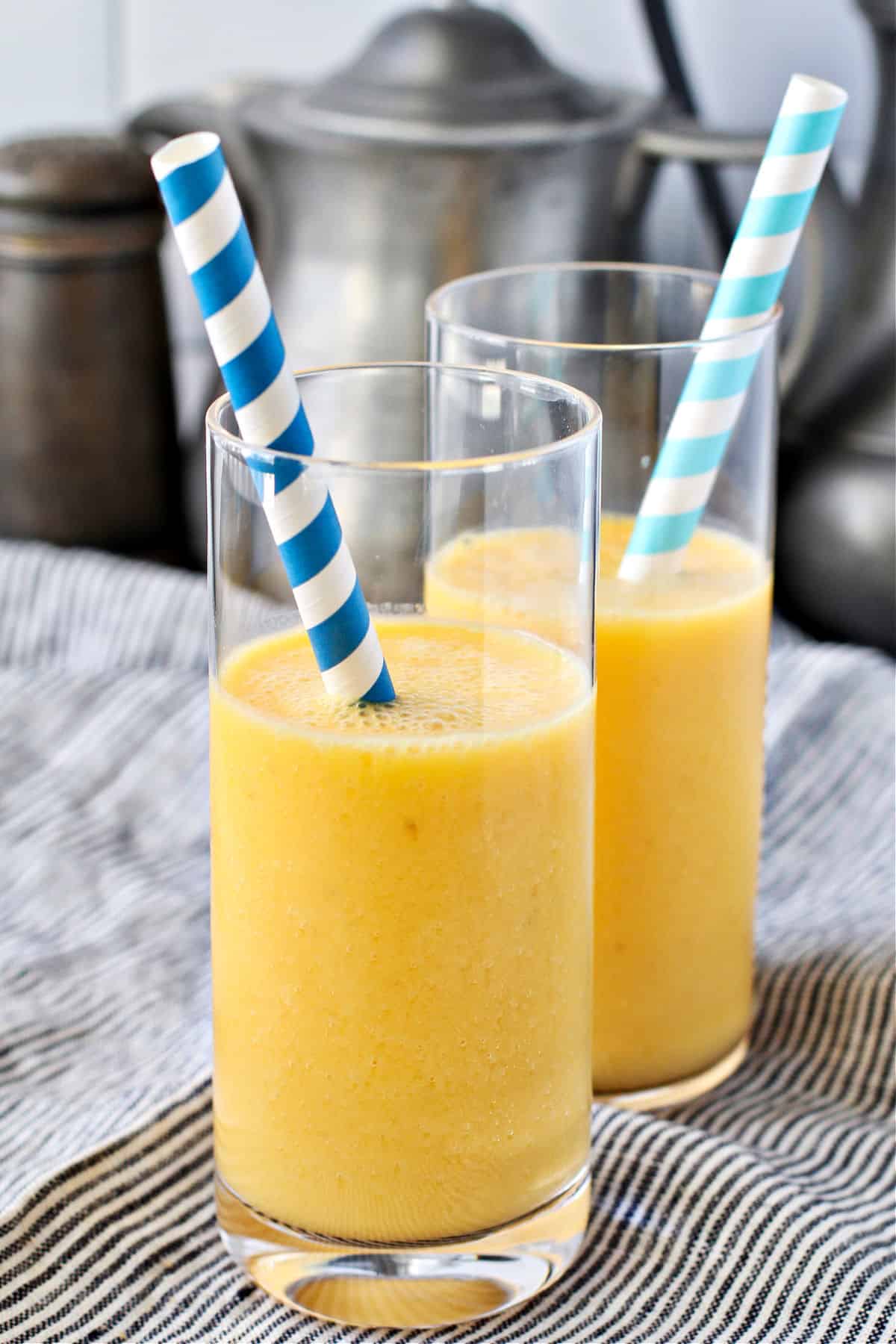 30-Second Smoothies in two glasses and blue striped straws.
