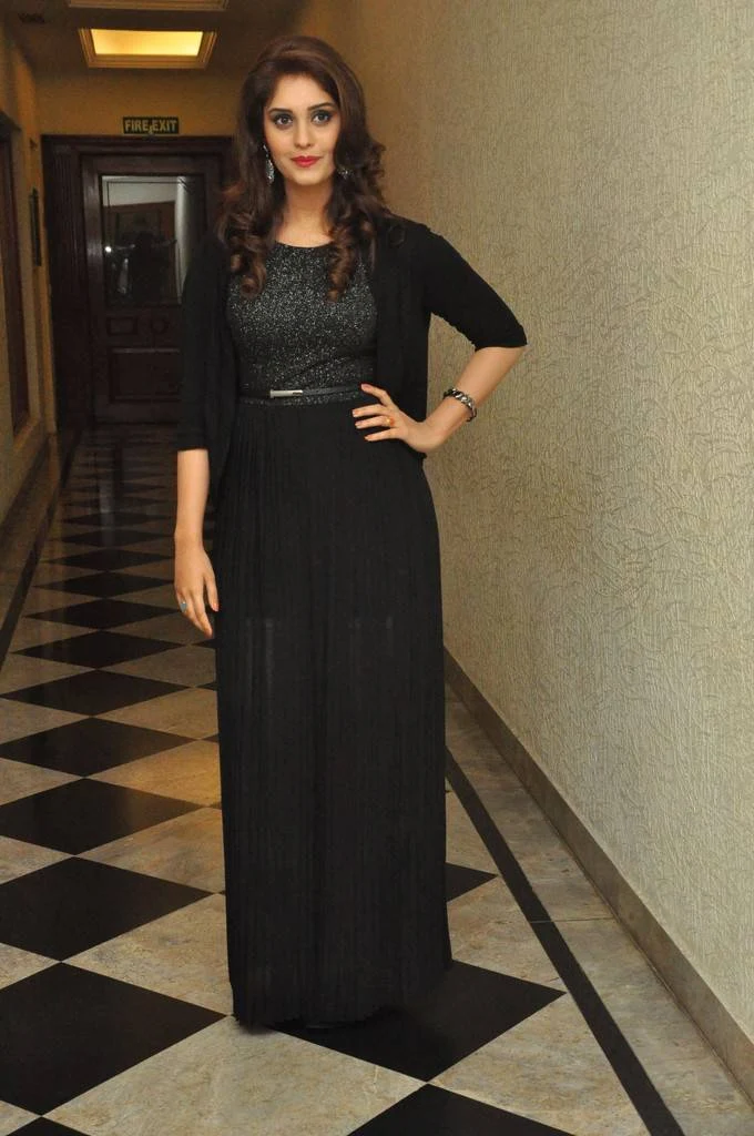 Actress Surabhi Stills At Audio Launch In Black Dress
