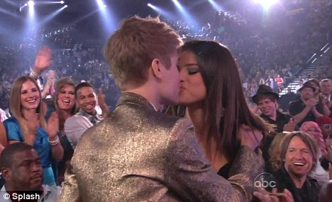 selena gomez justin bieber kiss billboard. Bieber and Gomez embraced