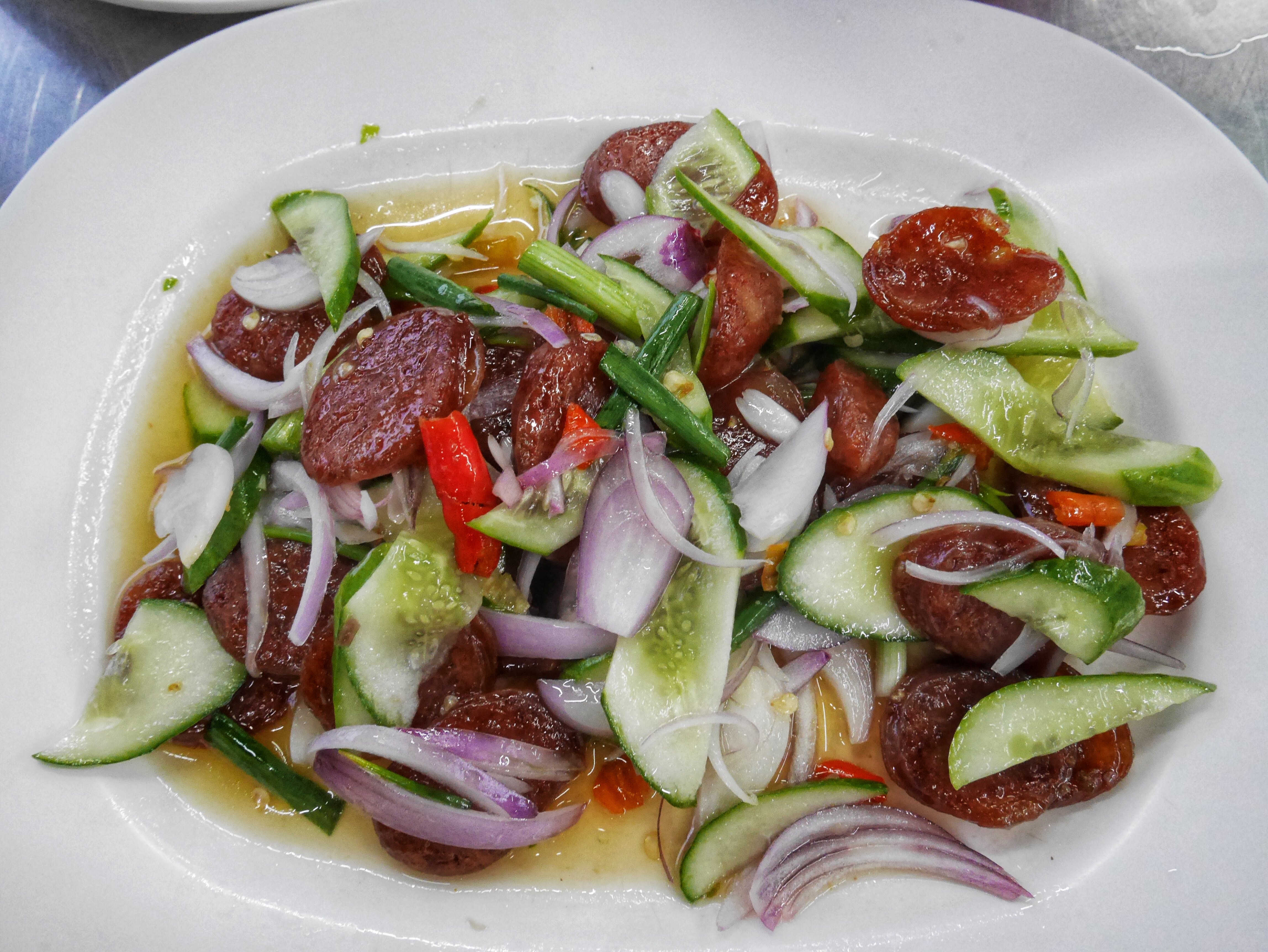 Yum Kun Chiang, or Thai Spicy Salad with Sweet Chinese Sausage in Hat Yai, Thailand
