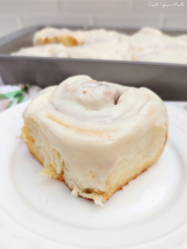 The BEST Bread Machine Cinnamon Rolls with Cream Cheese Icing! An easy-to-follow bread machine recipe for tender, billowy cinnamon rolls filled with cinnamon butter and brown sugar topped with the perfect cream cheese buttercream icing.