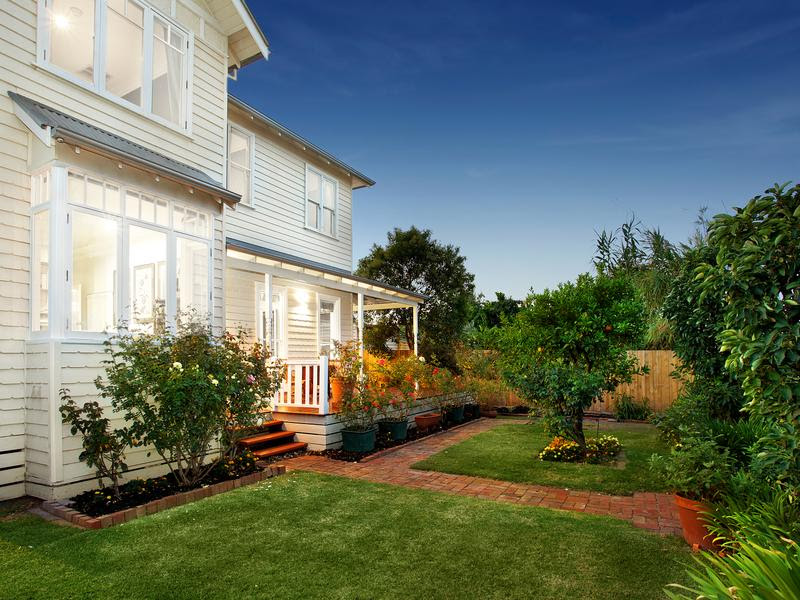 The rear garden and the sympathetic first floor extension. 