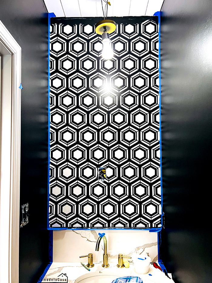Powder room makeover with hexagon stenciled wall