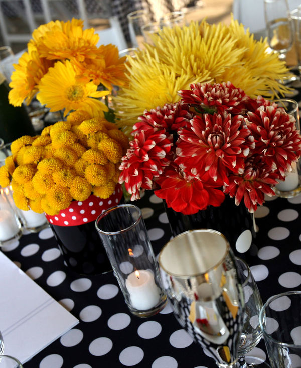 More gorgeous centerpieces in red and yellow flowers