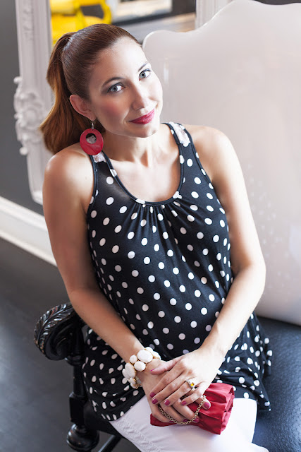 Travel and Fashion blogger Amy West in a playful polka dot outfit post. 