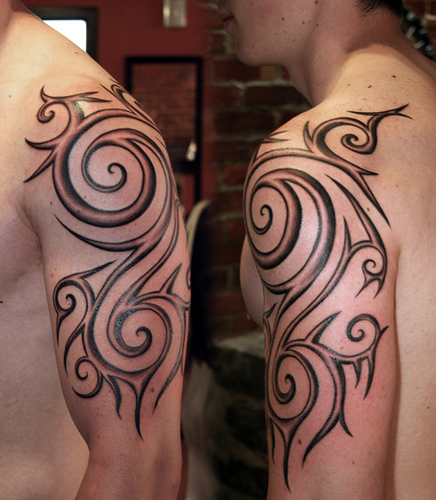 tribal tattoo arm chest. tribal tattoo arm chest.