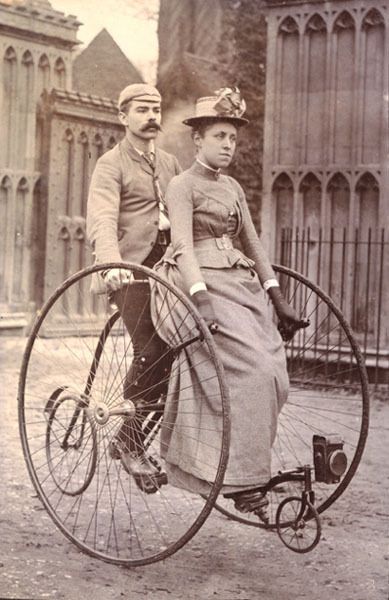 Vintage photograph of couple on a c.1890 Humber Rudge Travellertandem tricycle